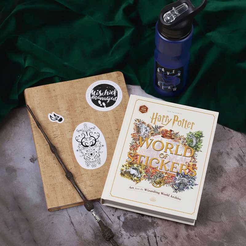 This keepsake book includes more than 934 full-color stickers and showcases unique art inspired by the Harry Potter films.
Create magical decorations and designs with the more than 934 stickers in this collectible book that features Harry Potter film-inspired art! Along with stickers of house crests and banners, Patronus guardians, fantastic beasts, Quidditch equipment, the Yule Ball, images from Diagon Alley—including Weasleys’ Wizard Wheezes and Ollivanders Wand Shop.