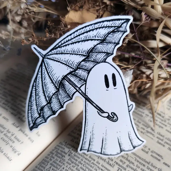 A little ghostie on a rainy day, printed on a sticker to add some wholesome spooky charm to your laptop, water bottle, or any other surface. From my original pen and ink artwork.
Die-cut vinyl sticker, suitable for interior or exterior use. Measures approximately 76mm (3 inches) tall.