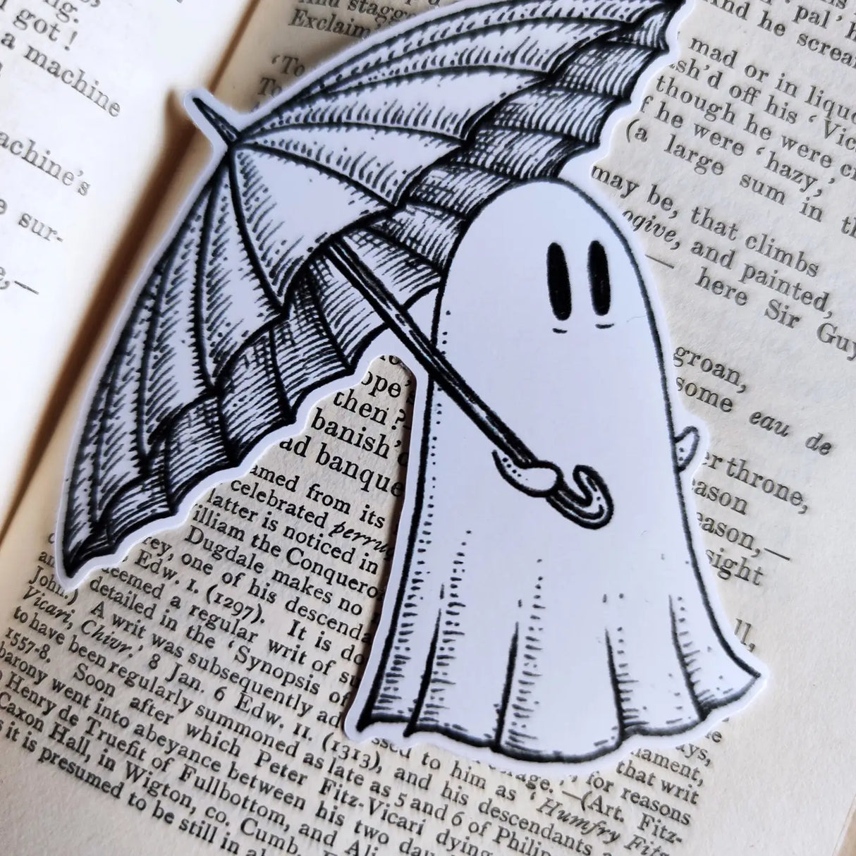 A little ghostie on a rainy day, printed on a sticker to add some wholesome spooky charm to your laptop, water bottle, or any other surface. From my original pen and ink artwork.
Die-cut vinyl sticker, suitable for interior or exterior use. Measures approximately 76mm (3 inches) tall.