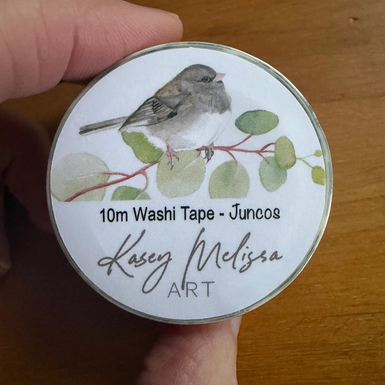 Dark eyed junco birds and butterflies washi tape. Add a bit of whimsical color to your journal, letters or scrapbooking. Put a bird on it!
• Eco-friendly, high-quality washi tape
• Size: 25.4mm x 10m
• Sold individually
• Shrink-wrapped with a coordinating hand designed label
• Hand painted design by Kasey Lewis
• Imported
Images and art copyright Kasey Melissa Art