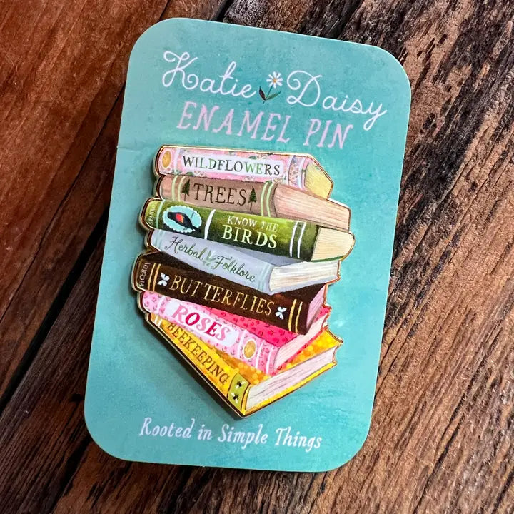 Books Enamel Pin by Katie Daisy
A tiny treasure to pin on your jacket, tote, or favorite old flannel—each one a little love letter to country delights, small joys, and the art of noticing.
