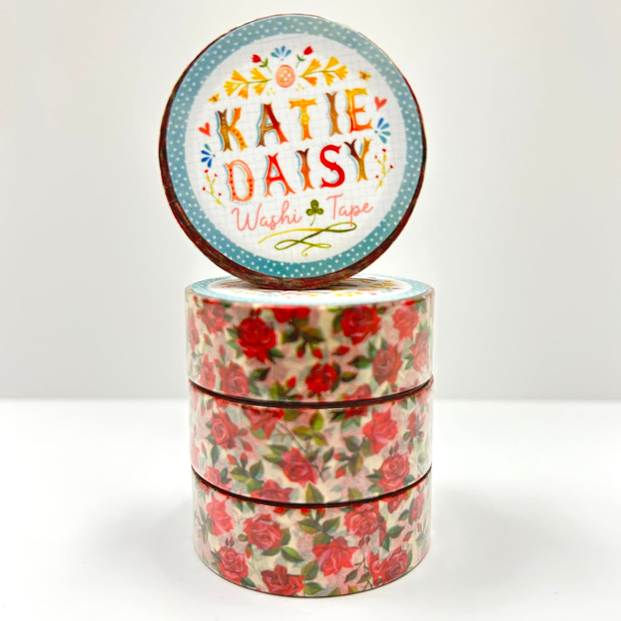 Katie Daisy - Rose Washi Tape
There are so many uses for washi tape! You can use it for scrapbooking, gift wrapping, and even home decor projects :) Add some extra charm to your letter-writing, use it to tack up photos... the possibilities are endless!
Details:
* Traditional washi tape, printed on rice paper
* Each roll is 15mm wide, 10m long, and the pattern reprints every 350mm.
* Semi-transparent 