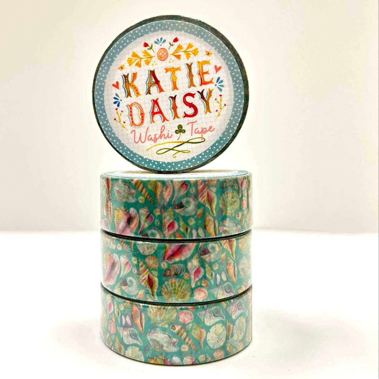 Katie Daisy - Seashell Washi Tape
There are so many uses for washi tape! You can use it for scrapbooking, gift wrapping, and even home decor projects :) Add some extra charm to your letter-writing, use it to tack up photos... the possibilities are endless!
Details:
* Traditional washi tape, printed on rice paper
* Each roll is 15mm wide, 10m long, and the pattern reprints every 350mm.
* Semi-transparent 