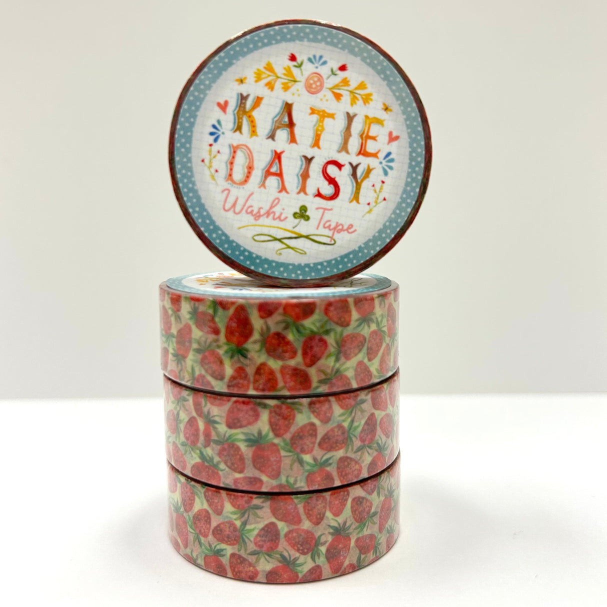 Katie Daisy - Strawberry Washi Tape
There are so many uses for washi tape! You can use it for scrapbooking, gift wrapping, and even home decor projects :) Add some extra charm to your letter-writing, use it to tack up photos... the possibilities are endless!
Details:
* Traditional washi tape, printed on rice paper
* Each roll is 15mm wide, 10m long, and the pattern reprints every 350mm.
* Semi-transparent 
