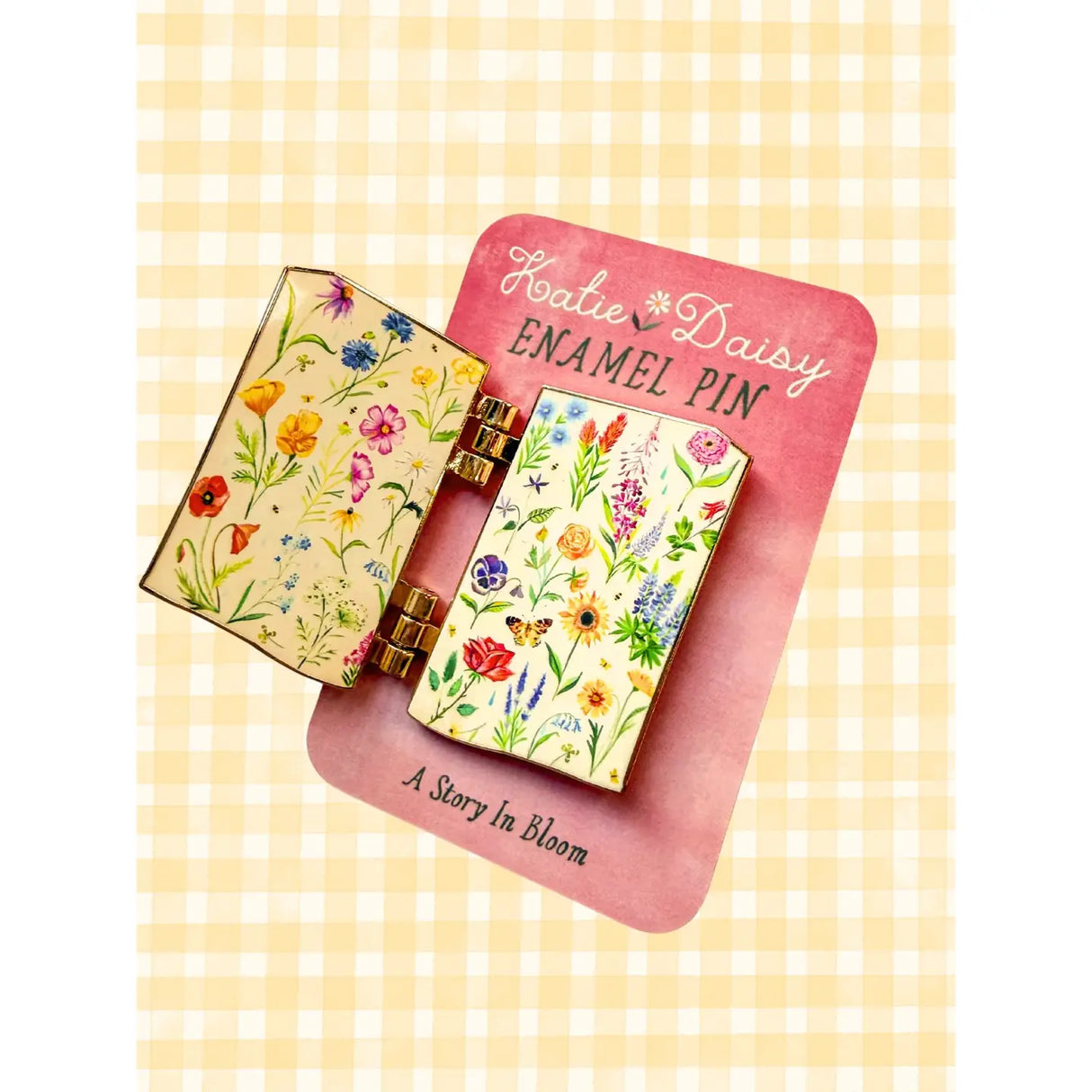 A tiny treasure for book lovers, wildflower wanderers, and collectors of small beautiful things.
This interactive enamel pin features a working hinge that allows the miniature book to open and close, revealing a hidden floral spread inside. Inspired by beloved vintage books and meadow blooms, it’s a little story you can wear on your jacket, tote, sweater, or favorite old flannel.
Details:
• 1.75” on the longest side
• Interactive hinged design that opens like a tiny book
• Gold-plated finish
• Rich, detail