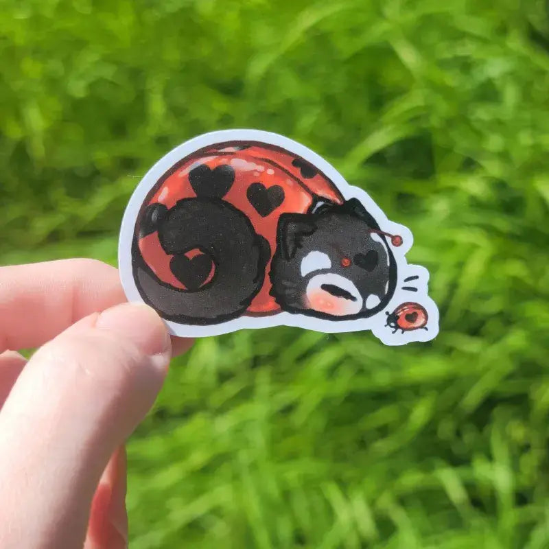 Katrina Wold Art - Tiny Cat Vinyl Sticker - Summer Ladybug
2.25" matte vinyl sticker featuring a sleepy ladybug kitty with a little ladybug friend.
Matte laminated vinyl sticker
Waterproof, UV- and scratch-resistant
Features original, 100% hand-drawn art
Actual color may vary due to differences in lighting, device screen settings, etc.