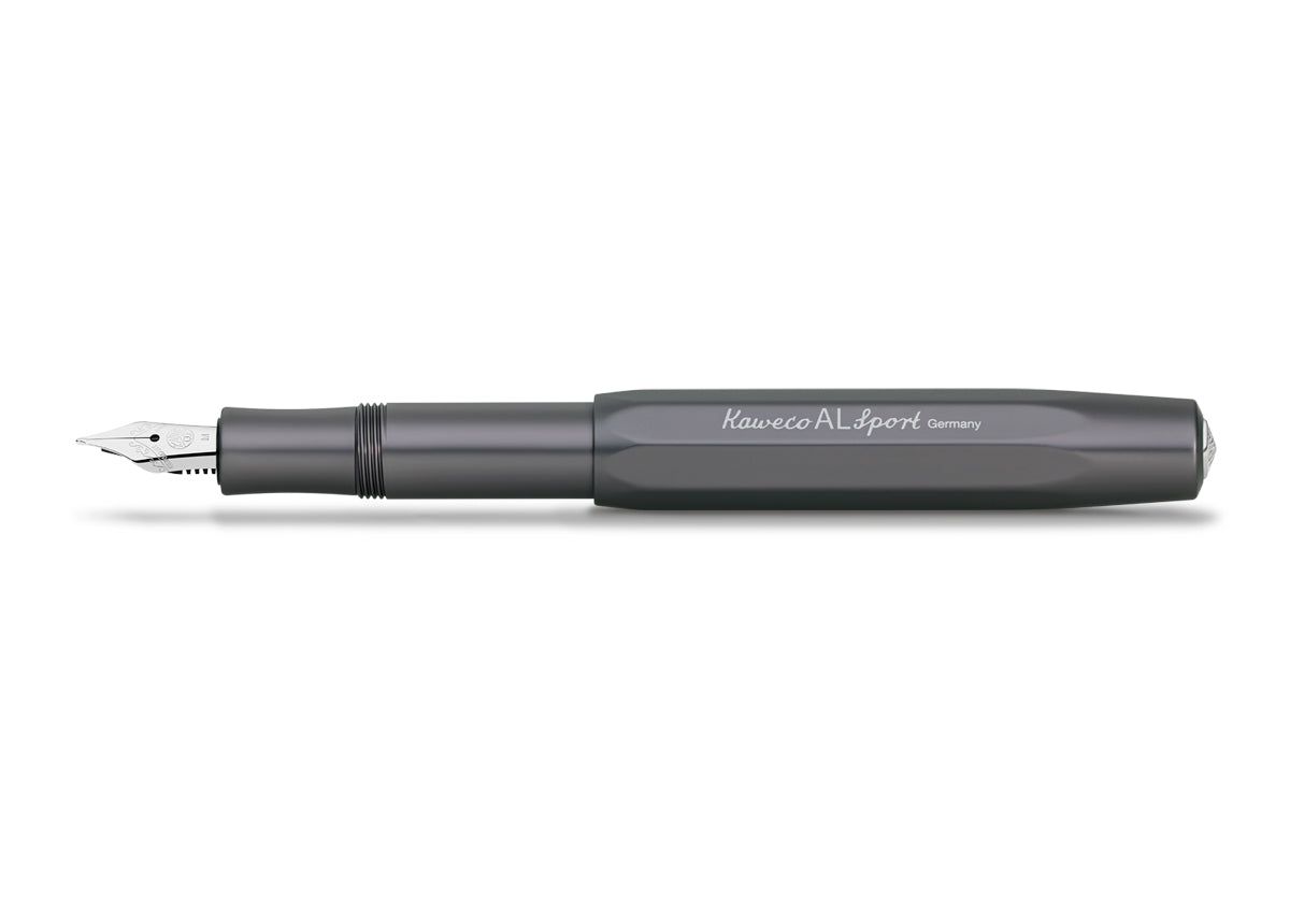 Our AL Sport fountain pen anthracite is a pen to behold. The silky, glossy surface in a warm grey tone has an expressive and noble appeal. It is a perfect accessory for everyday use in the office, daily life, and leisure.
The metallic body is made of high-quality aluminium and grants an unique haptic experience. Its fine surface imparts elegance.
This pocket fountain pen only measures 10.5 cm when closed and is, therefore, a perfect everyday pen. When the cap is attached, the pen grows to a standard size