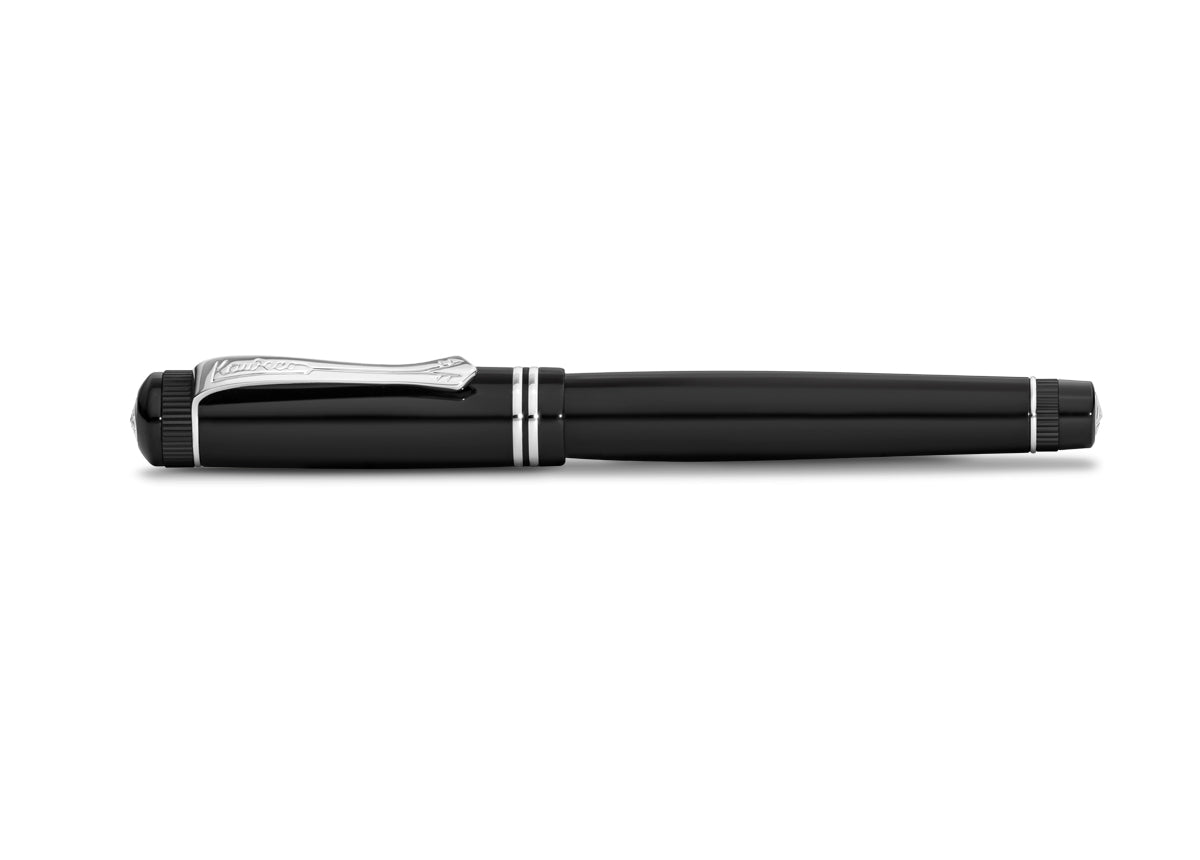 Luxurious roller ball in nostalgia design made of high-grade acrylic with elegant elements.
The decorative elements and proportions are based on those of the golden 1920s. This treasure of the German heyday of art, culture and science has been preserved in detail. The Gel Roller allows effortless writing and an exceptionally writing experience.
The roller ball consists of more than 15 individual parts. The pen lining is made of deep black acrylic (PMMA) and polished and assembled by hand.
The Kaweco DIA2