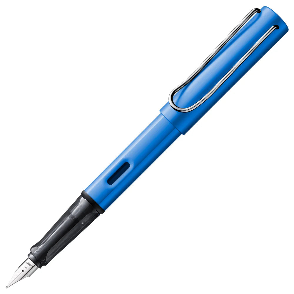 Light, lighter, LAMY AL-star: the writing classic made of resistant aluminium masters all challenges of everyday life in style. The transparent grip lies comfortably in the hand and, with an unobstructed view of the ink duct, turns the functional into a visual highlight. The series is ever inspiring with new special editions in current trendy colours and is thus an inspiring must-have in any pencil case.
Lightweight fountain pen with polished steel nib and ergonomic grip made of high-quality transparent pl