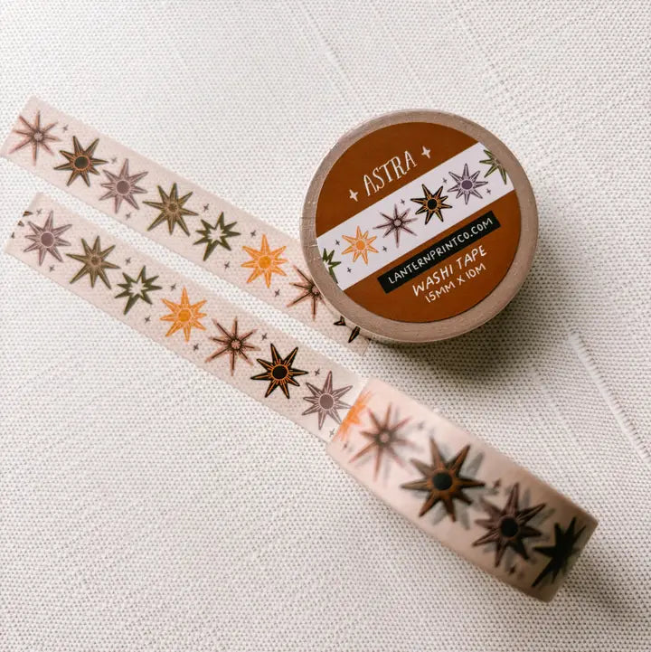 Removable Washi craft tape for journaling and gift wrapping; featuring whimsical celestial stars on a cream background.
15mm x 10m
Shrink wrap packaging with label