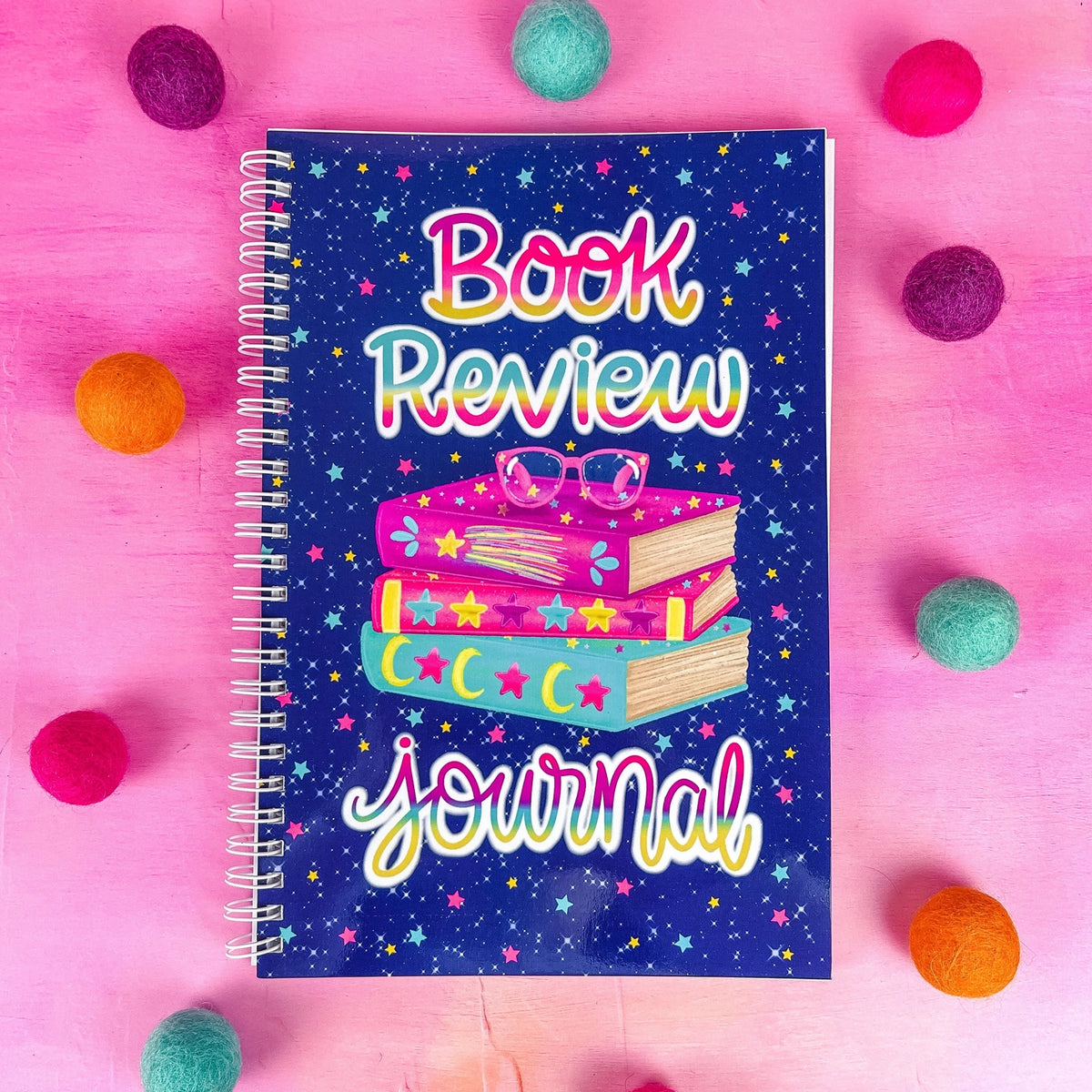 Keep track of your book reviews with this cute book review journal. There are 100 pages for different book reviews. Each review page includes the Title, Author, Start and Finish Dates, Star Rating, Favorite Quote area and your Review!
*DETAILS*
Size: 6x9"
Paper: 80lb interior paper
Wire coil binding
Gloss laminate cover