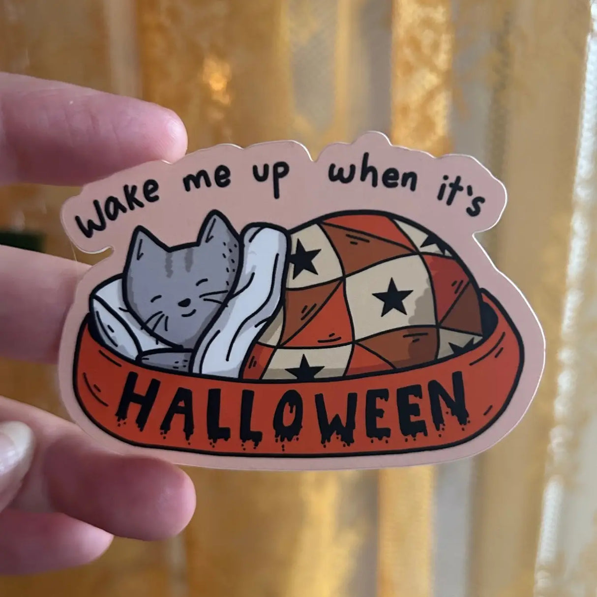 A gray sleeps in a little bed with a blanket and pillow, dreaming of October days.
3in wide
Waterproof
Matte Finish