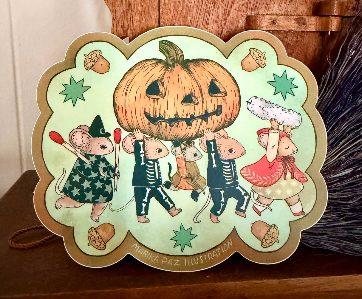 A halloween parade brings out the Jack-o-lantern!
This vinyl matte sticker is weather and waterproof-stick it on a notebook, bike, or car- it's going to stick around! Heck, throw it on a water bottle and through the dishwasher. This sticker can go anywhere. Sticker measures 4." x 4.5" Printed in USA.