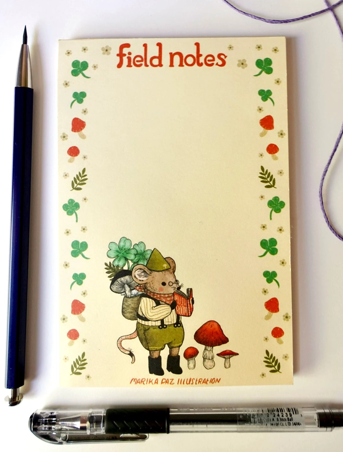 Marika Paz Illustration - Field Notes Notepad
A little field mouse goes mushroom foraging. This notepad is great for field notes, lists, and more!
Notepad is 4 x 6", 50 pages of 70lb paper. Comes in a cello sleeve for protection.
Printed in USA