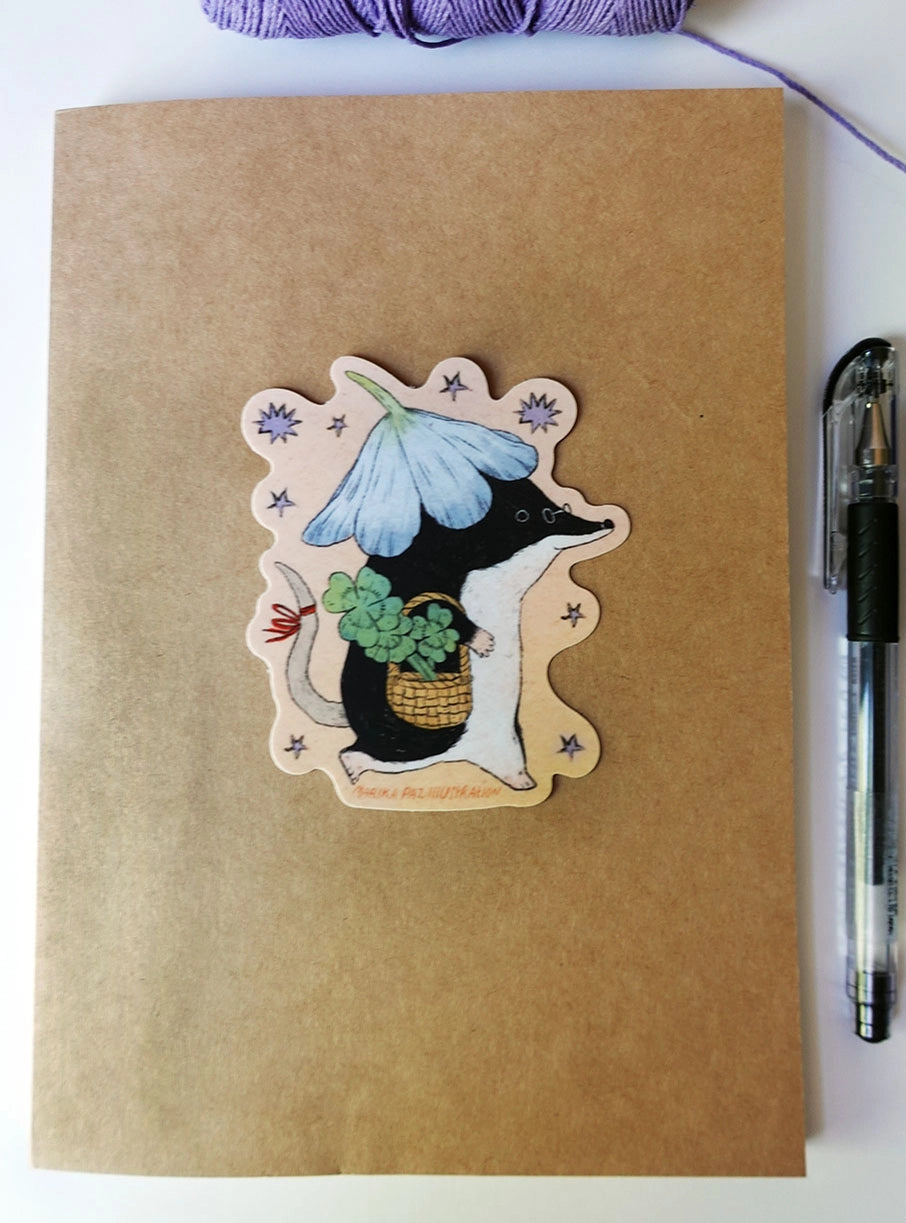 A shrew goes for a walk with some luck in their pocket! This vinyl matte sticker is weather and waterproof-stick it on a notebook, bike, or car- it's going to stick around! Heck, throw it on a water bottle and through the dishwasher. This sticker can go anywhere.
Sticker measures 3" x 4"
Printed in USA.