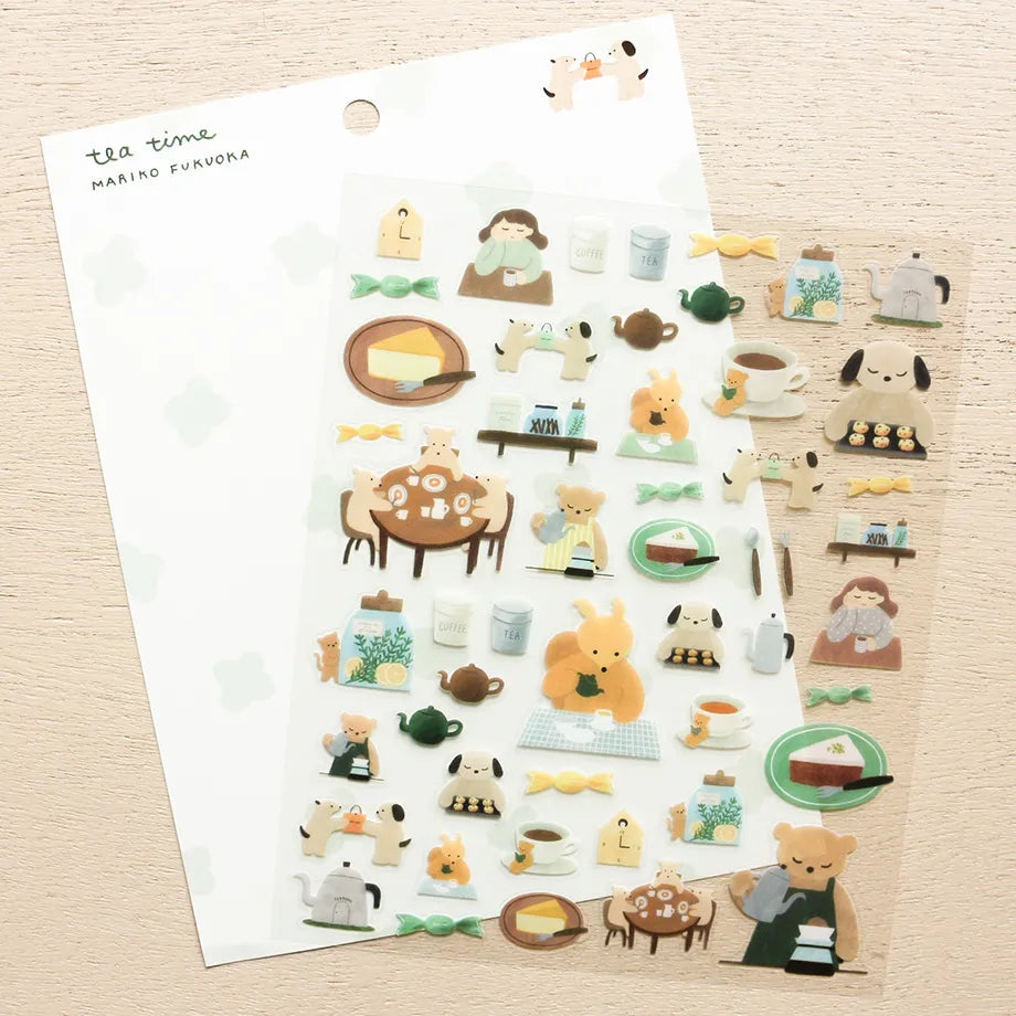 This cute sticker designed by illustrator Mariko Fukuoka looks like a delicious aroma might waft through the air at any moment. Freshly baked cookies served with coffee brewed by a bear barista.
Printed on PET material, the stickers have a smooth, durable finish that’s easy to peel and place - great for both everyday use and special projects.
✨ Product Details
Smooth, durable PET sticker material
Perfect for planners, journals, scrapbooking, and cardmaking
Backing Sheet Size: 141 × 188 mm
Sticker sheet