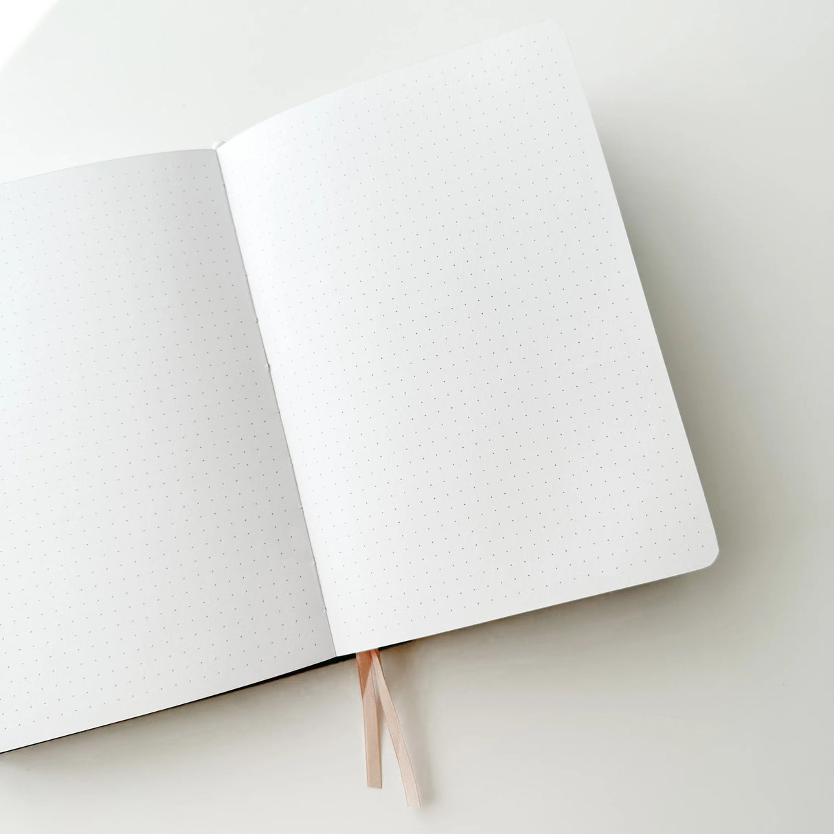 Soot Spirits Journal with Holographic Edges and Logo! ✨
Product Details:
Size: A5 (5.70 x 8.26 inches)
160 Dotted Grid Pages (5 x 5 mm)
2 Bookmarks
Elastic Band and Pen Holder
Expandable storage compartment