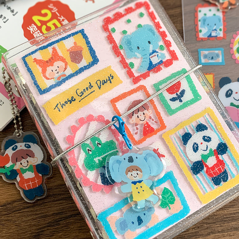 Molinta Binder - Crayon Animal
Add sparkle and sweetness to your planning routine with the Crayon Animal Binder, featuring a glitter‑covered finish that makes every journaling moment feel extra magical. This compact binder blends Molinta’s signature crayon‑style animal artwork with fun, tactile shimmer — perfect for anyone who loves cute stationery with personality. An elastic closure keeps your pages secure, while the adorable panda costume keychain adds a playful finishing touch that makes this