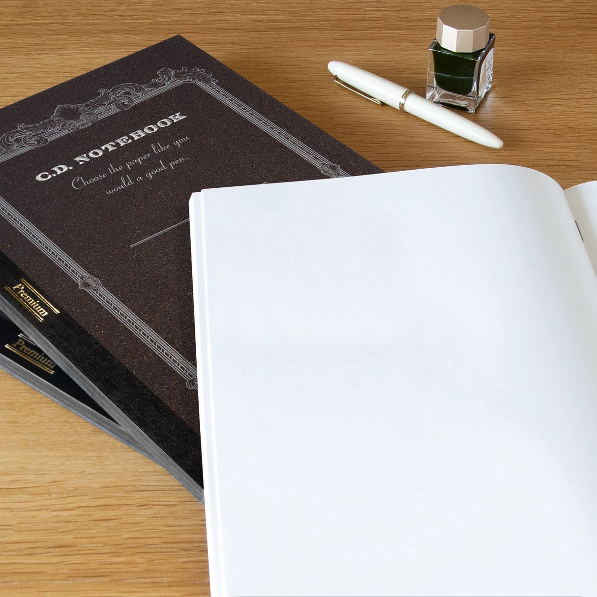 High-quality notebooks are ideal for jotting down ideas, taking notes, sketching, making lists and more. They are perfect for use at home or the office.
Contains silky white, acid free paper that allows for effortless writing.
Notebooks available in ruled, grid and plain paper options.
Heavy duty covers feature a glitter accent.
Silver and gold foil text on the cover also decorate this upscale notebook.
Sturdy thread binding allows the notebook to lay flat for comfortable writing.
Red threading matc
