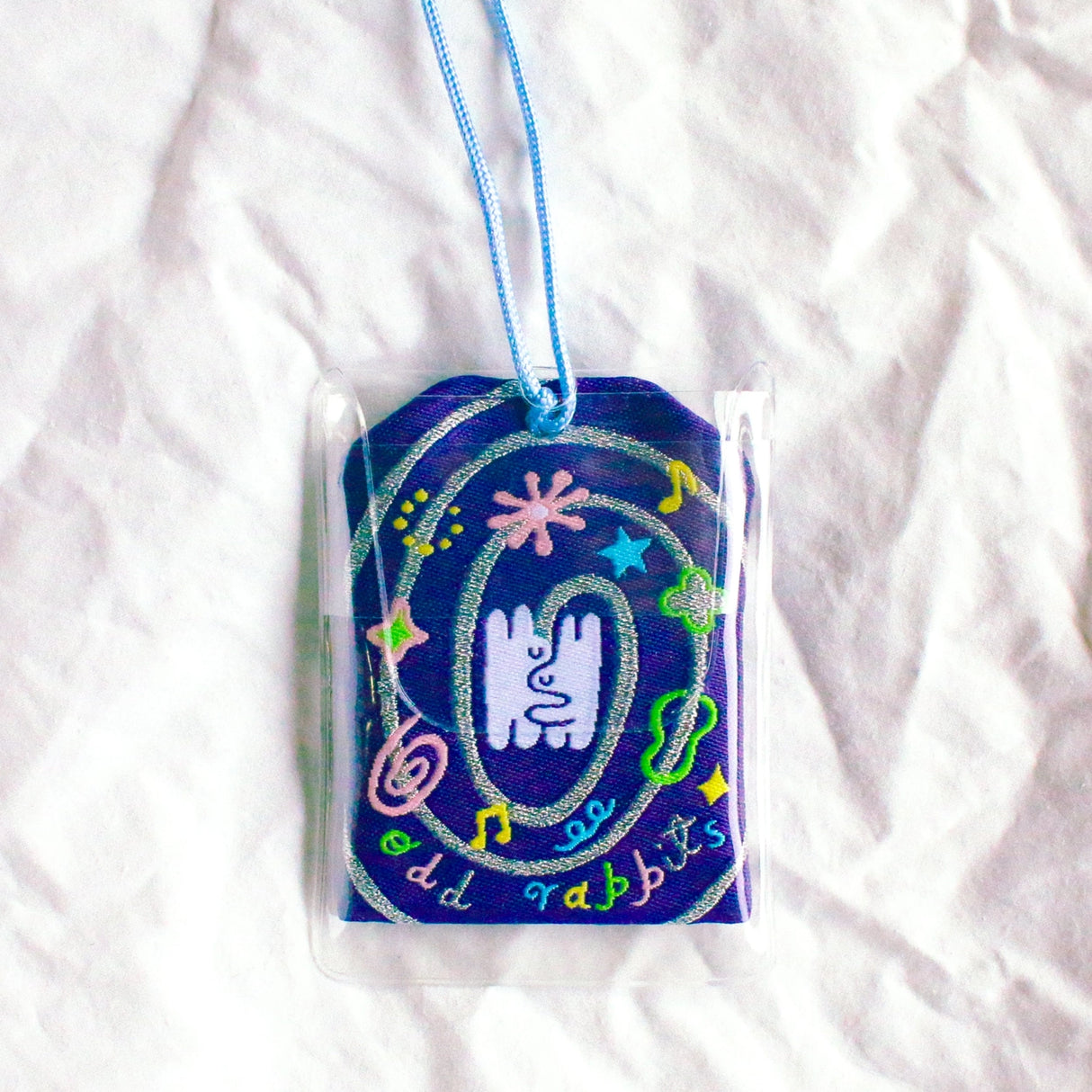 2x2.5 omamori charm with a 8 inch string.
An omamori is a Japanese charm that provides protection and luck!
