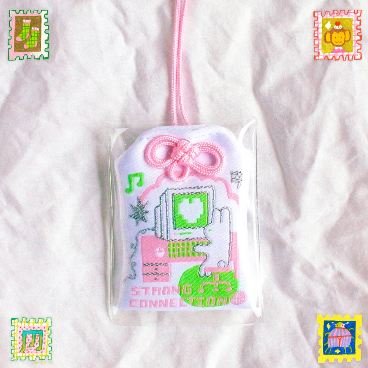 2x2.5 omamori charm with a 8 inch string.
An omamori is a Japanese charm that provides protection and luck!