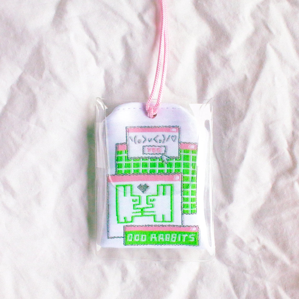 2x2.5 omamori charm with a 8 inch string.
An omamori is a Japanese charm that provides protection and luck!