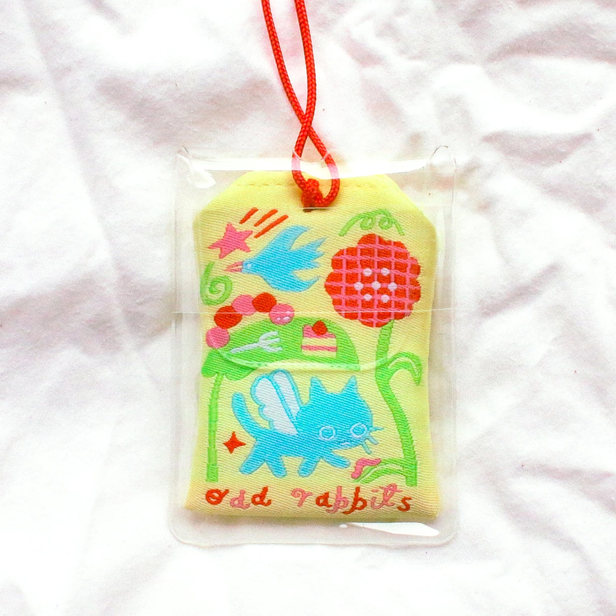 2x2.5 omamori charm with a 8 inch string.
An omamori is a Japanese charm that provides protection and luck!