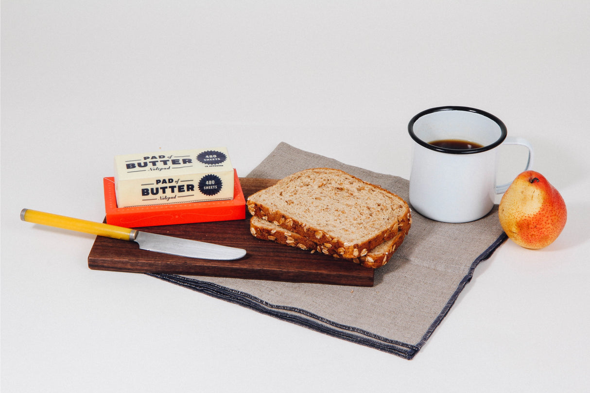 Pad of Butter Notepad
This non-stick notepad—perfect for slathering brilliant ideas onto—makes a charming stocking stuffer and low-calorie gift.