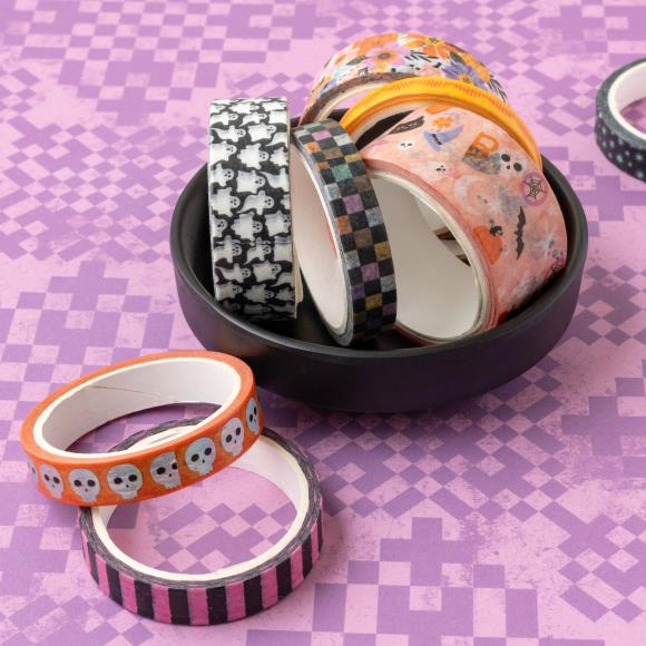 Add a touch of spooktacular charm to your creative projects with the Washi Tape from the Tricks And Treats Collection by Paige Evans for American Crafts.
This package includes eight rolls of tape featuring a variety of designs, such as pink and black stripes, skulls, ghosts, and more.
The rolls range in width from 0.375" to 0.875" and each measures six yards in length, giving you a total of 48 yards of tape to play with.
Whether you're decorating cards, scrapbook pages, envelopes, tags, journals, planner