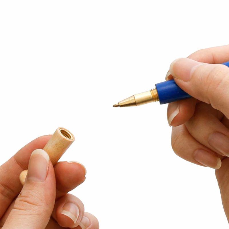A wooden baseball bat pen by Penco. The bat handle acts as the cap, and the pen tip is made of brass.
Comes in black oil-based ink with 0.8mm tip. 