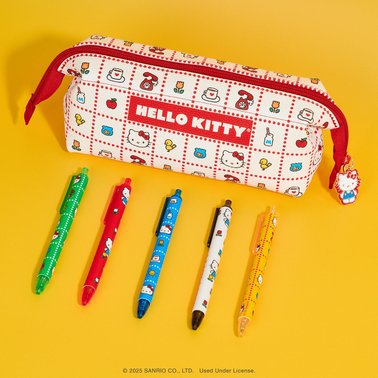 Meet your new favorite stationery essential! Featuring a vibrant, retro-inspired Hello Kitty pattern, this perfectly sized pouch is the ideal home for your pens, pencils, and any other small stationery items. The smooth-glide zipper keeps everything secure, but the true showstopper is the irresistible Hello Kitty-shaped zipper charm! Whether you’re a student, a Hello Kitty fan, or just looking to add a touch of fun to your organization, this pouch is a total game-changer.
© 2025 SANRIO CO., LTD. Used