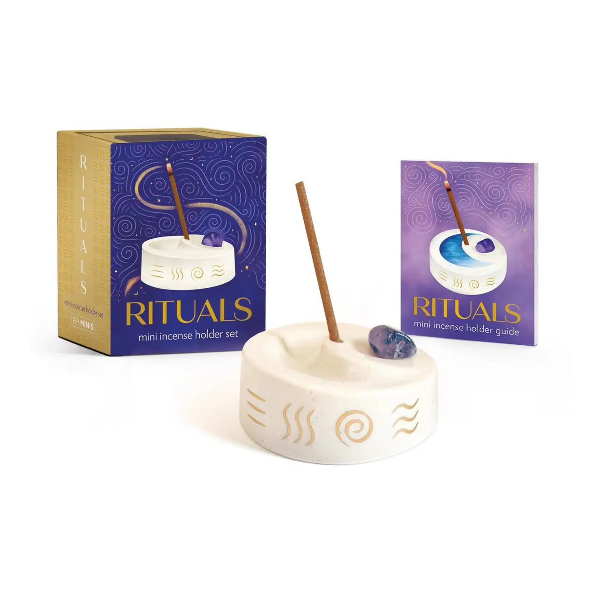 Add enchantment to your wellness routine with Rituals Mini Incense Holder Set, a self-care set featuring a ceramic incense holder, incense, crystal, and more. The perfect addition to your practice. Bring calm and wonder to your self-care practice with this expertly curated set of enriching wellness tools.
Ceramic incense holder. Set the tone for meditation or relaxation with incense. Each set includes a molded ceramic incense holder and incense sticks.
Includes 1-inch crystal. Your self-care set includes a