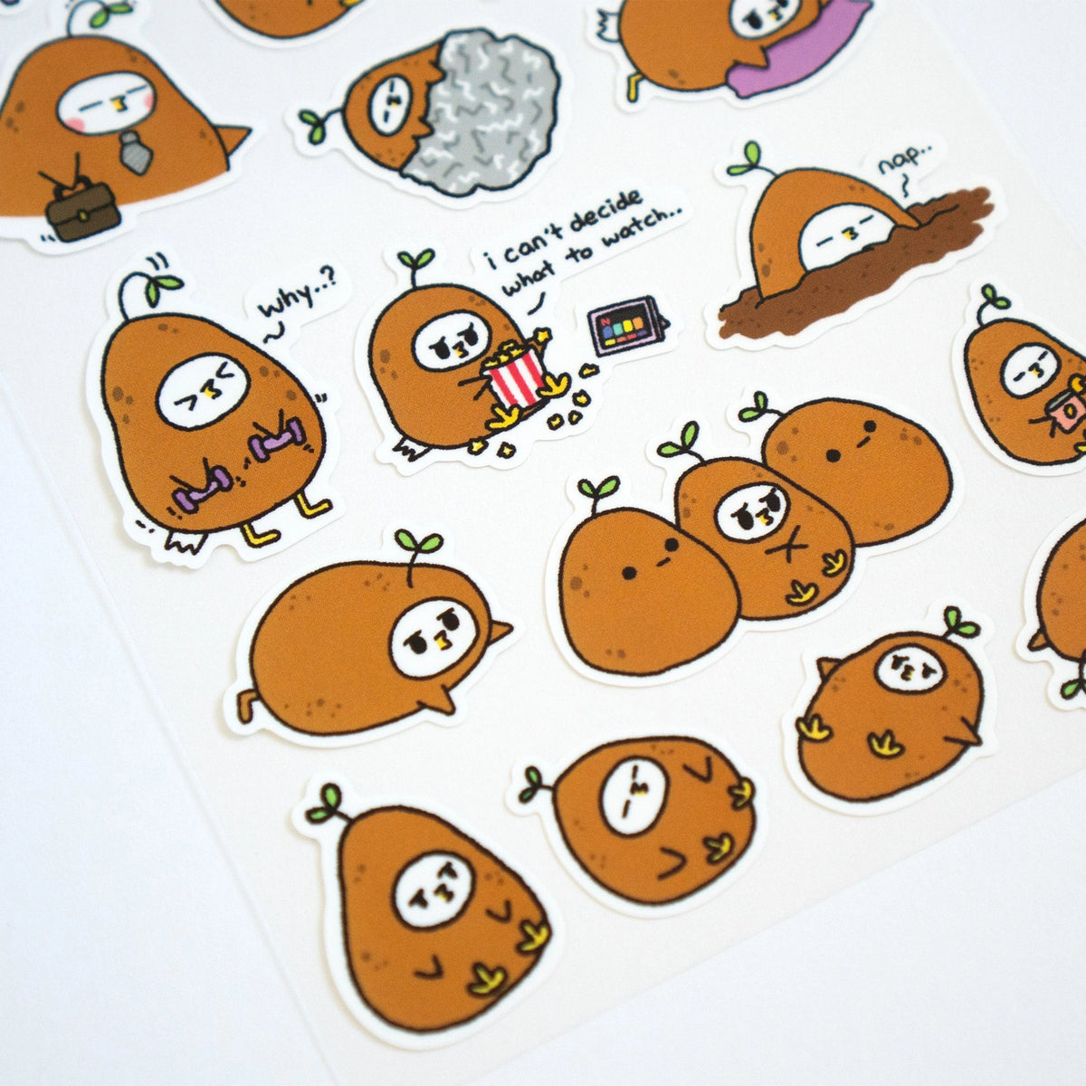 Grumpy Chicken is all about that potato life.
There are 18 individual stickers on the sheet.
They are vinyl stickers on a clear plastic sheet with a backing card.
The whole packaging is 3.8 x 8.75" and is ready to hang.
The sticker sheet is 3.75 x 5.8"