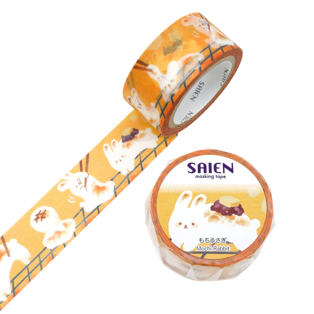 Plump little watercolor rabbits hop across this tape like tiny mochi treats, round, gentle, and irresistibly cute. Their soft orange hues pair beautifully with the translucent texture of Japanese paper, giving each bunny a warm, glowing sweetness. Part of SAIEN’s Time of Fruits series, this design blends delicate color with a cozy, hand‑painted charm.