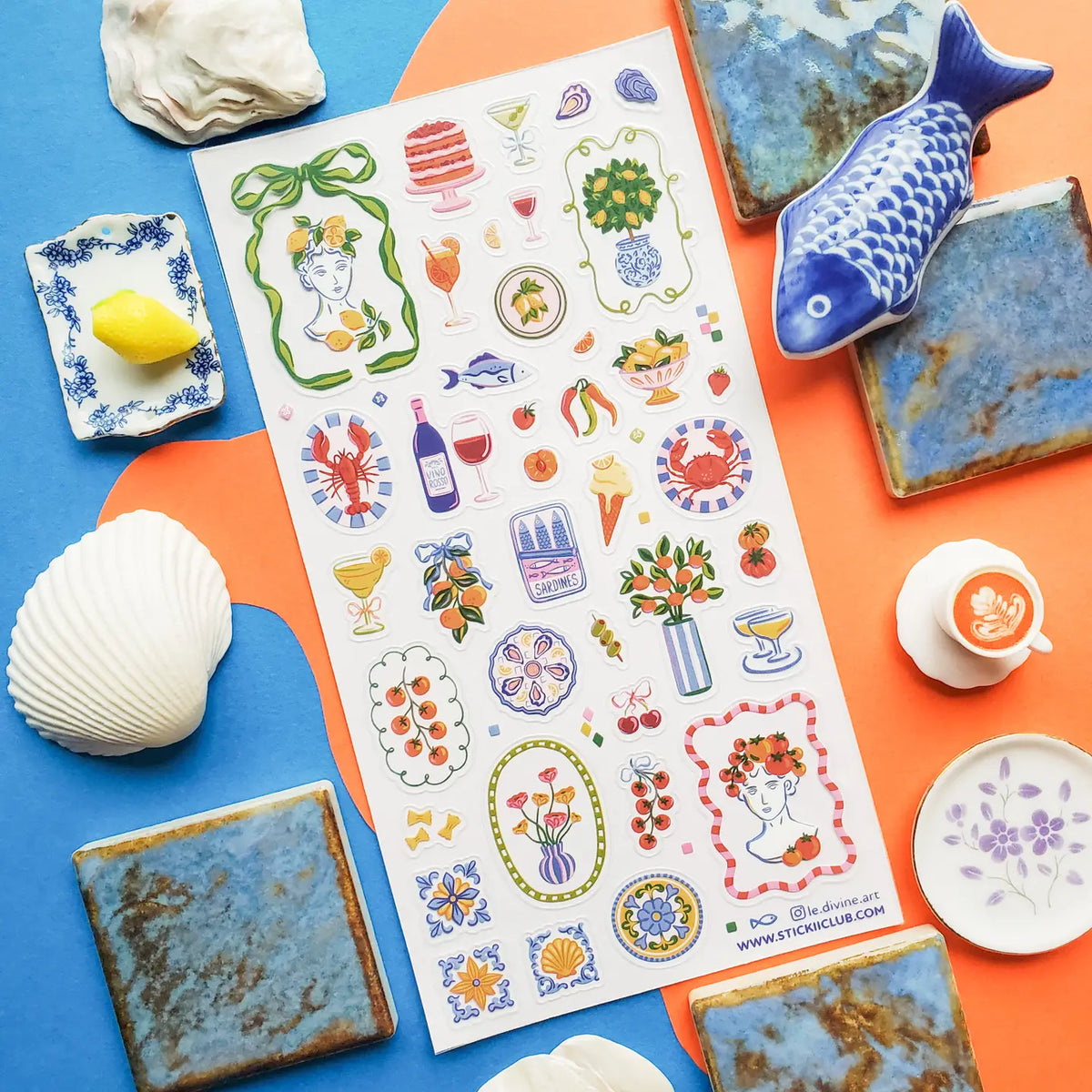 🍋🦞 Ciao to sunny days, seaside snacks, and a table full of color! This playful sheet is packed with lemons, tomatoes, seafood, spritzes, sardines, patterned tiles, and plenty of Mediterranean flair. Add in a few artsy portraits and bright floral details, and it’s basically a whole summer getaway squeezed onto one sticker sheet.
Top Coating: None
Adhesive Layer: PVC (plastic)
Backing Layer: Clear
6.69" x 3.54".
Weight - 0.03lbs
1 sheet included