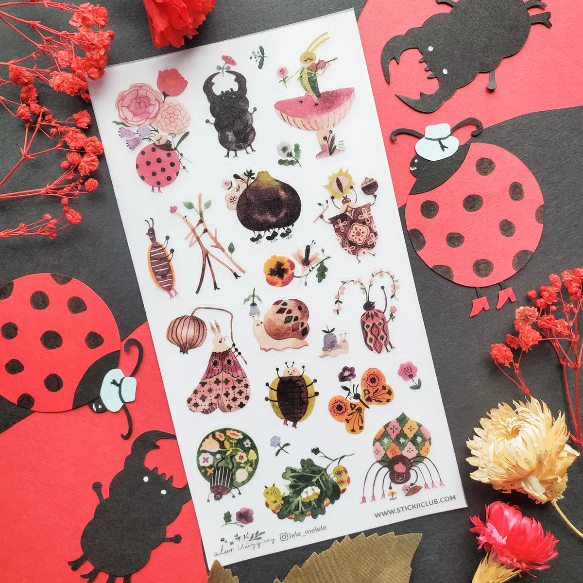 🎻🦗 Take a peek into a bug’s life with @lele_melele, where flower-crowned beetles, violin-playing grasshoppers, sleepy snails, fancy moths, and berry-toting critters are all out here living their best leafy lives. This sheet is like a secret bug party happening under the leaves and we need an invite immediately.
Art by: @lele_melele
One sticker sheet is included.
• Top Coating: None
• Adhesive Layer: Washi
• Backing Layer: Clear PET
• 6.69"x3.54"
• Weight-0.03oz
• 1 Sheet Included