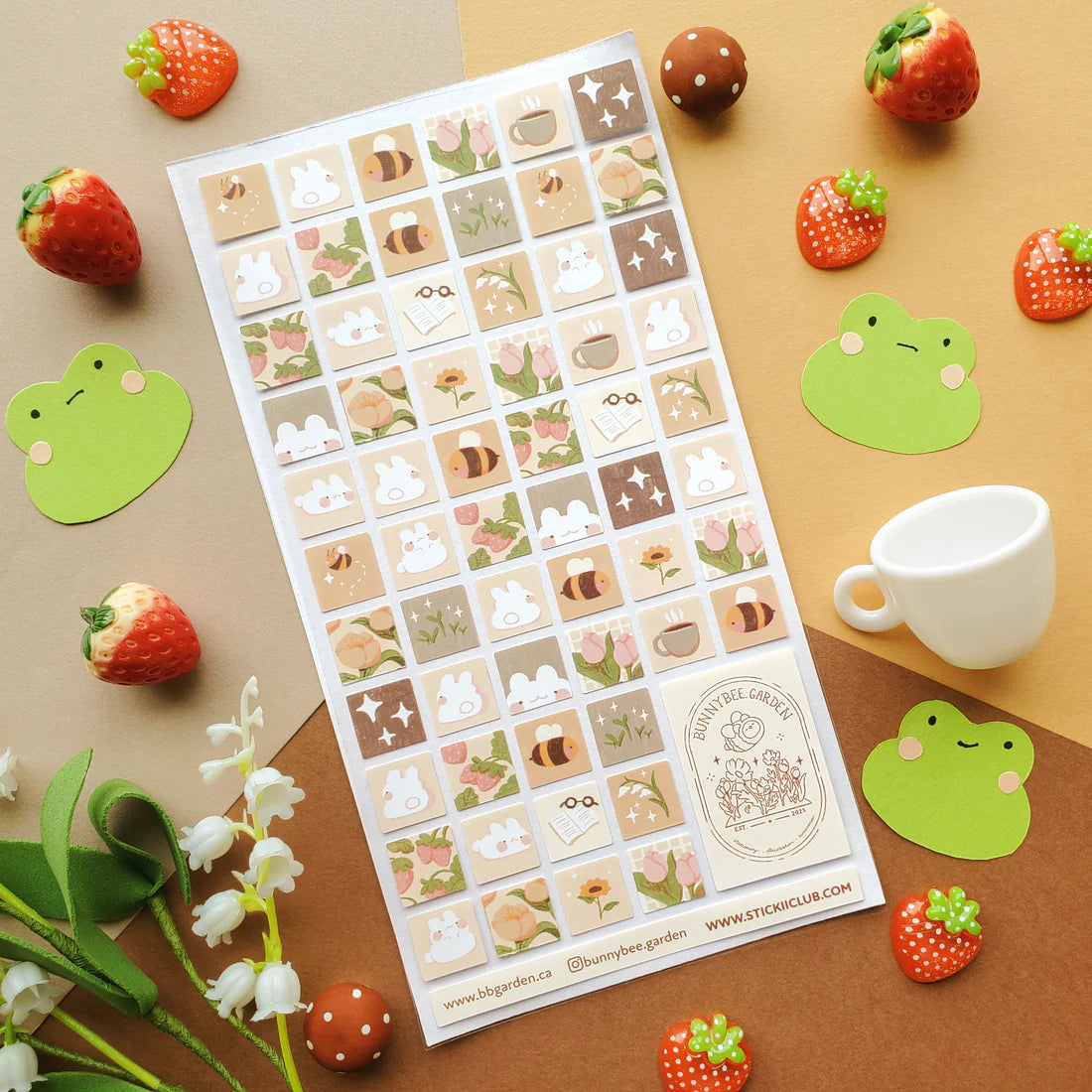 🌻🐝 Buzz on over to @bunnybee.garden’s whimsical garden, where chubby bunny-bees flutter through fields of flowers and cozy mushroom hideaways. From watering plants and zooming past blooming petals to splashing in puddles and snoozing in grassy corners, this sheet is bee-yond adorable.
Art by: @bunnybee.garden
Top Coating: None
Adhesive Layer: Paper
Backing Layer: Clear PET
6.69" x 3.54".
Weight - 0.03lbs.
1 sheet included