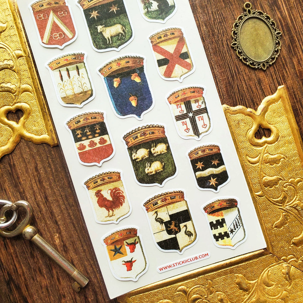 Step into the grand halls of ancient kingdoms with this striking collection of heraldic crests. From star-studded banners and geometric sigils to proud animal emblems symbolizing strength, loyalty, and courage, each shield carries the spirit of medieval artistry and old-world craftsmanship.
Top Coating: None
Adhesive Layer: Paper
Backing Layer: Clear PET
Size: 6.69" x 3.54"
1 sheet included