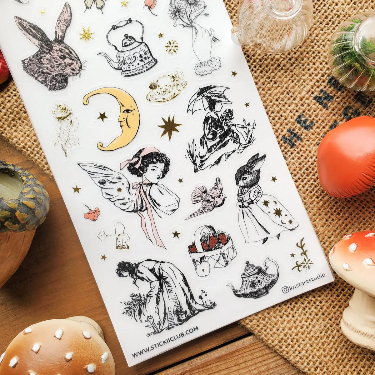 šš« Somewhere between an old garden journal and a moonlit tea party, @knstartstudioās enchanting sheet features rabbits in little outfits, winged maidens, buzzing bees, mushrooms, strawberries, roses, and ornate teapots. Itās cottage life with a hint of folklore, perfect for anyone who loves their farmhouse days served with tea leaves, wildflowers, and a little moonlight.
Art by: @knstartstudio
One sticker sheet is included.
⢠Top Coating: Gold foil
⢠Adhesive Layer: Washi
⢠Backing Layer: Clear PET
⢠6.
