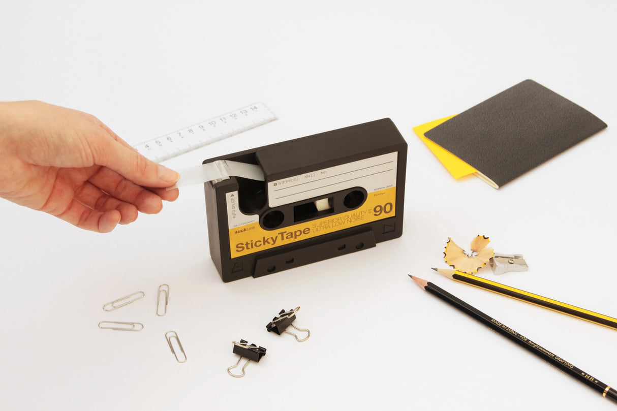So retro it hurts! Oversize cassette tape reimagined to hold and dispense sticky tape. Made from chunky heavyweight rubber that will grip your desk. Does everything a tape dispenser would normally do, but with buckets of nostalgic charm. A great gift for the old-school music geek in your life.