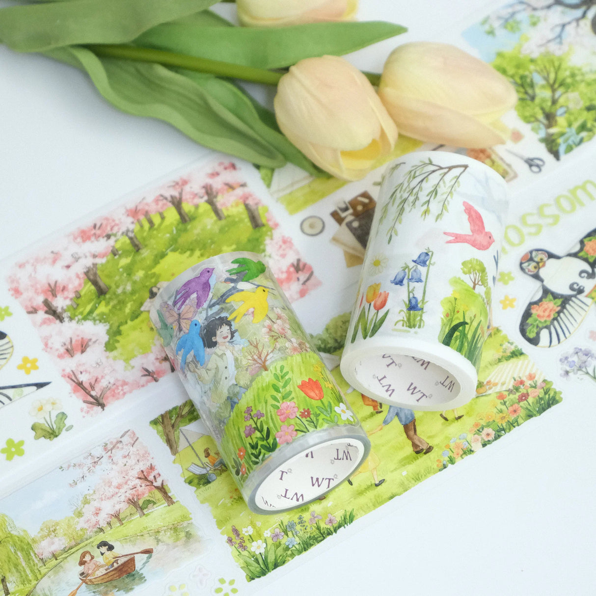 Step into a world where spring never ends. Our Sakura Voyage tape is a panoramic journey through a watercolor dreamland. Featuring hand-painted sceneries of weeping willows swaying in the breeze, vibrant kites dancing in the sky, and soft cherry blossoms in full bloom, every inch tells a story.
Brand: WT ( The Washi Tape Shop)
Pre-cut Wide Washi/PET Tape
Size: 70mm×5m
Design Loop: 100cm
Material: Washi Tape / PET Clear Tape