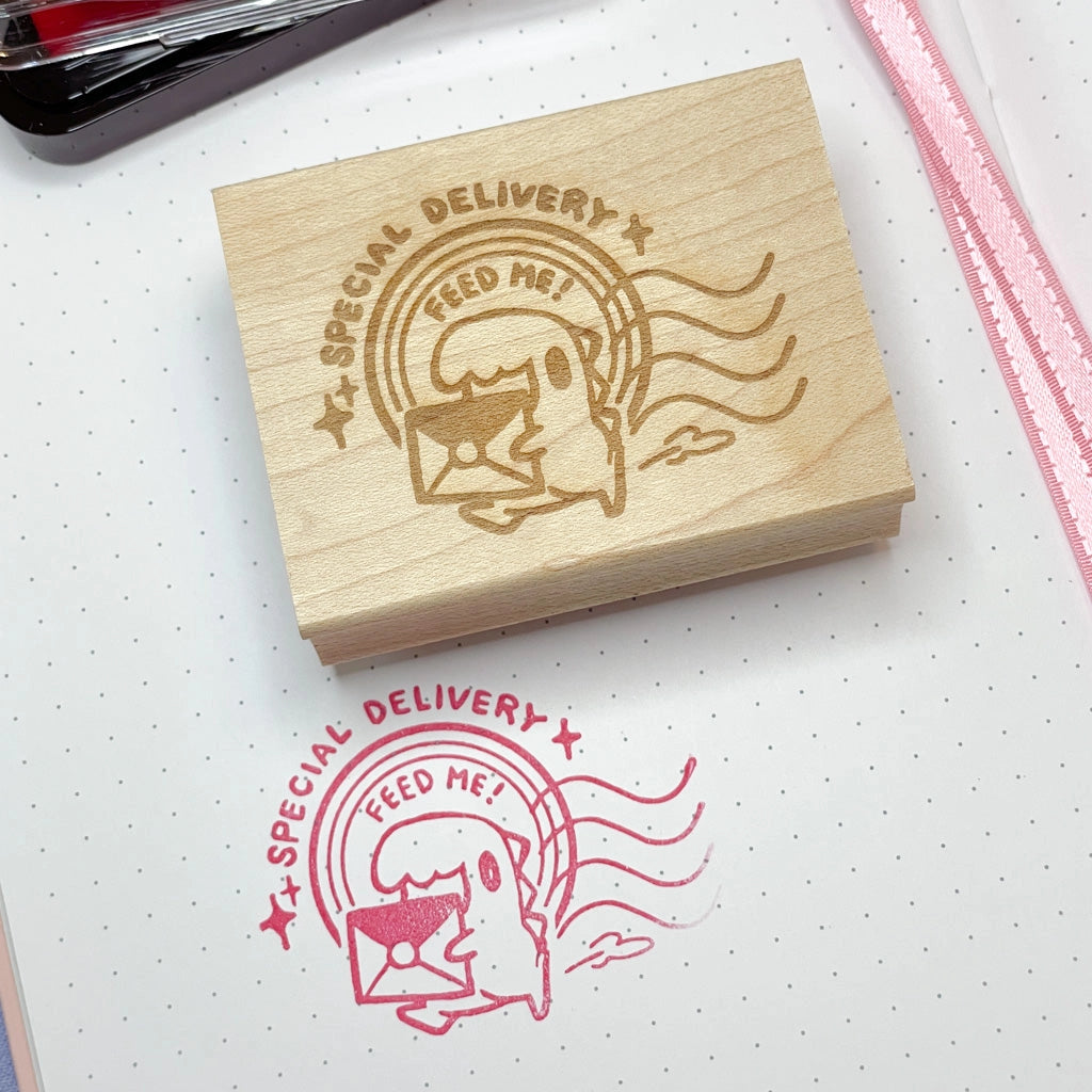 Love writing letters and doing BUJO? This official Tiny RPG postal stamp is going to bring you lots of joy! This wooden stamp is made with premium rubber for long lasting extra crisp details.
This wooden stamp is made with premium rubber for long lasting extra crisp details. This stamp is:
Roughly 2in x 1.6in
Mounted on a wooden base.
Hand made with love in the USA 
