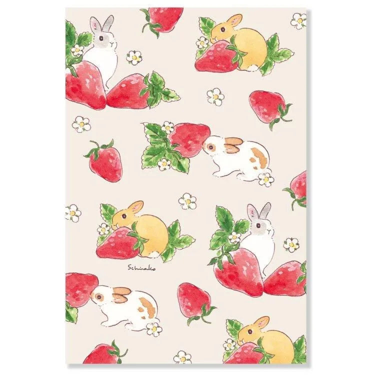 Hop into spring with this adorable postcard by Schinako Moriyama! This postcard features bunnies playing hide and seek with strawberries!
4in x 5.8in
