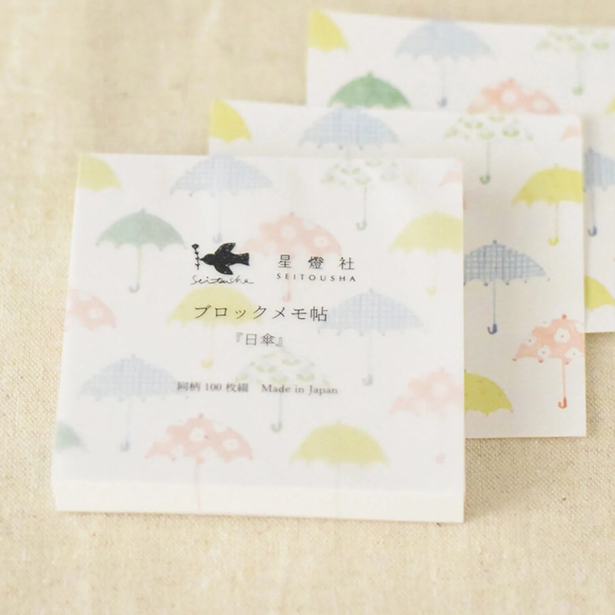 Seitousha Block Memo Pad - Parasol
Bring a soft touch of charm to your notes with the Seitousha block memo pad. Illustrated in the brand’s signature gentle, nostalgic style, each sheet features a sweet parasol‑themed design that feels airy, whimsical, and perfect for brightening your everyday writing.
✨ Product Features
Perfect for decorating planners, journals, cards, gifts, and scrapbooks
100 Sheets