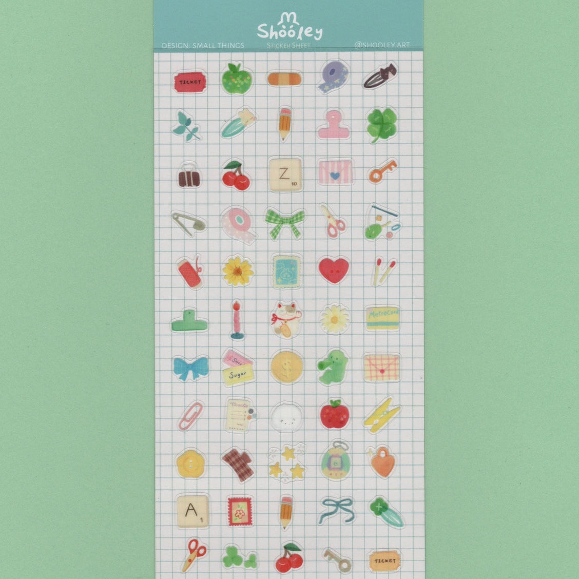 Shooley Small Things Sticker Sheet
Clear vinyl sticker sheet. Each sheet comes with a backing card. Sticker material is water resistant.