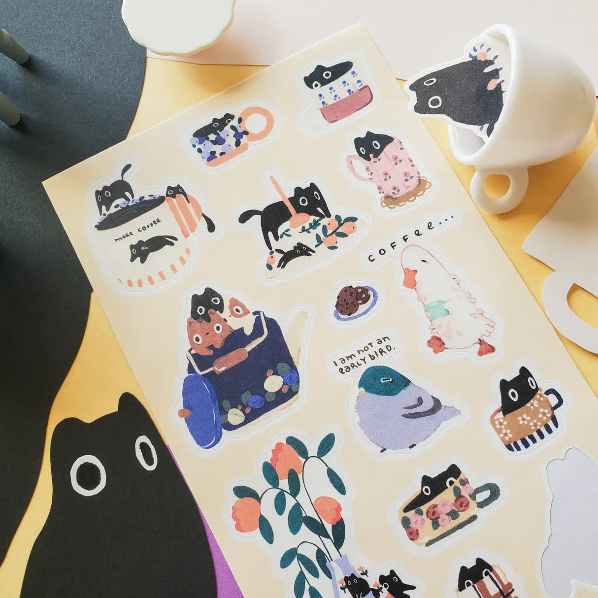 ☕🐾 Mornings come in all moods, and @kieferngruen captures them all! Sleepy kitties peek out from warm mugs, a grumpy little bird insists it’s not an early riser, while others are already buzzing (or flopping) their way into the day. One of these is definitely the spirit sticker for your morning start!
Art by: @kieferngruen