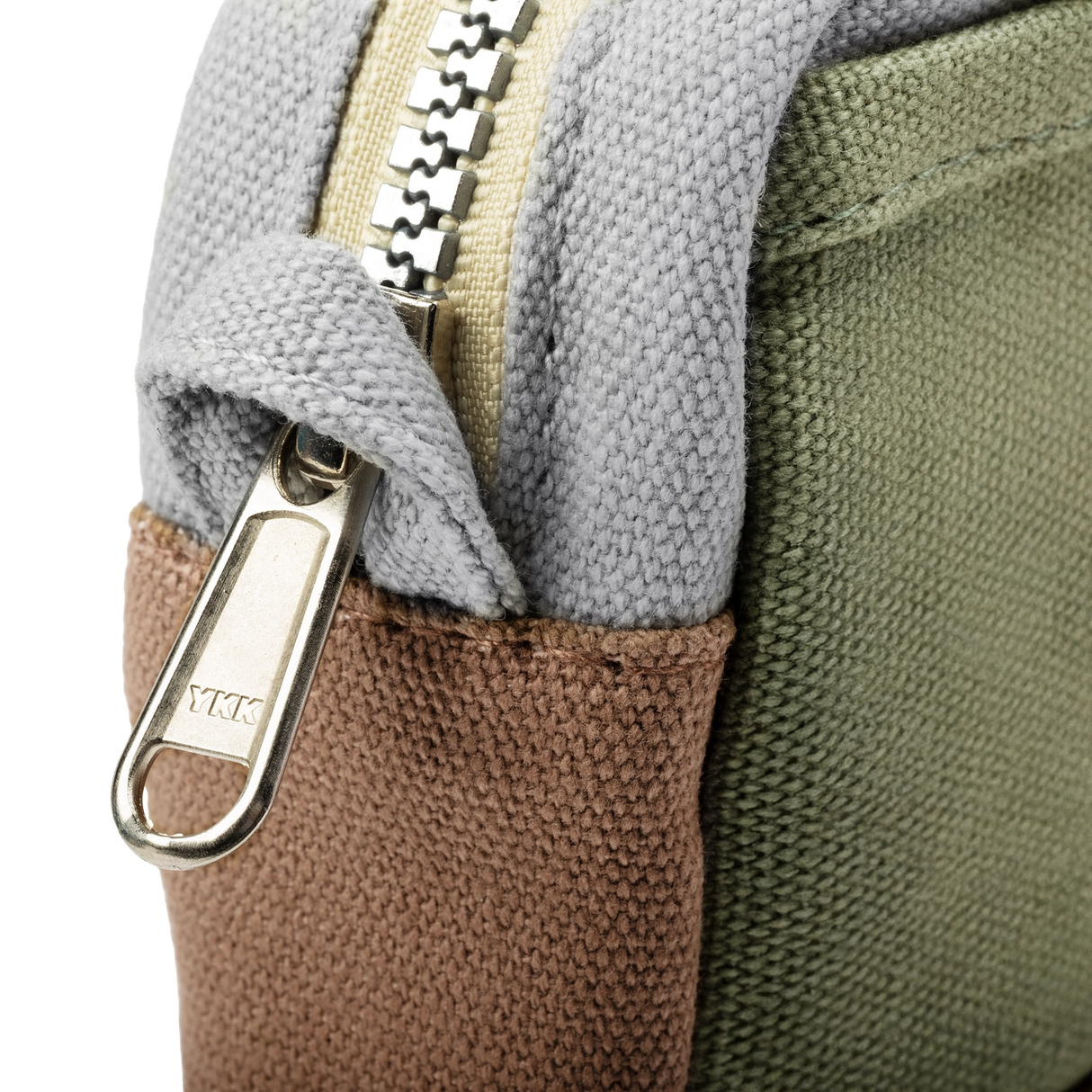 Features & Specs
Front layout: 8 slanted pockets + 3 directly behind
Interior: Main compartment fits an A5 notebook; two open compartments on each wall
Back panel: 3 wide exterior pockets + one full-length slip pocket
Quick-drying duck canvas — sturdy, breathable, and machine-washable
Convertible design — hooks for your own strap or a Soolla strap (coming soon)
Structured silhouette — holds its shape even when lightly packed
Full-width YKK zipper — smooth and durable
Compact profile — fits