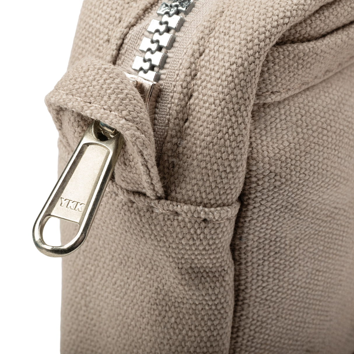 Features & Specs
Front layout: 8 slanted pockets + 3 directly behind
Interior: Main compartment fits an A5 notebook; two open compartments on each wall
Back panel: 3 wide exterior pockets + one full-length slip pocket
Quick-drying duck canvas — sturdy, breathable, and machine-washable
Convertible design — hooks for your own strap or a Soolla strap (coming soon)
Structured silhouette — holds its shape even when lightly packed
Full-width YKK zipper — smooth and durable
Compact profile — fits