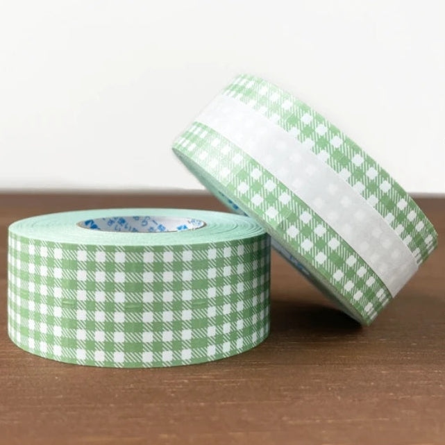 Stamp Marche Gingham Label Sticker Roll - Dusty Green
Label stickers with Stamp Marche original designs. These are stickers originally for price tag applicators,now featuring a gingham check pattern! They can also be used to seal letters and envelopes, or as decorative materials for your planner. Fold them in half to use as index stickers or write or stamp them. Each pack contains 1,000 stickers with the same design, making them ideal for daily use or sharing.
Product Size: Approx. 55 x 21.6 mm