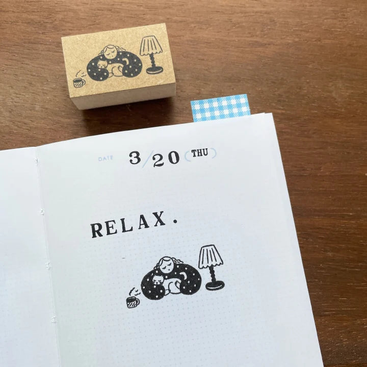 Bring a touch of charm to your journaling with this adorable Marl‑chan wooden stamp from Stamp Marche. Featuring the brand’s signature sign girl, this illustration stamp adds personality and warmth to planners, letters, scrapbooks, and creative projects.
Each stamp is crafted with a solid wooden mount and high‑quality rubber, giving you crisp, clean impressions every time. Whether you’re decorating daily spreads or adding a cute accent to handmade cards, Marl‑chan brings a delightful, whimsical feel to yo